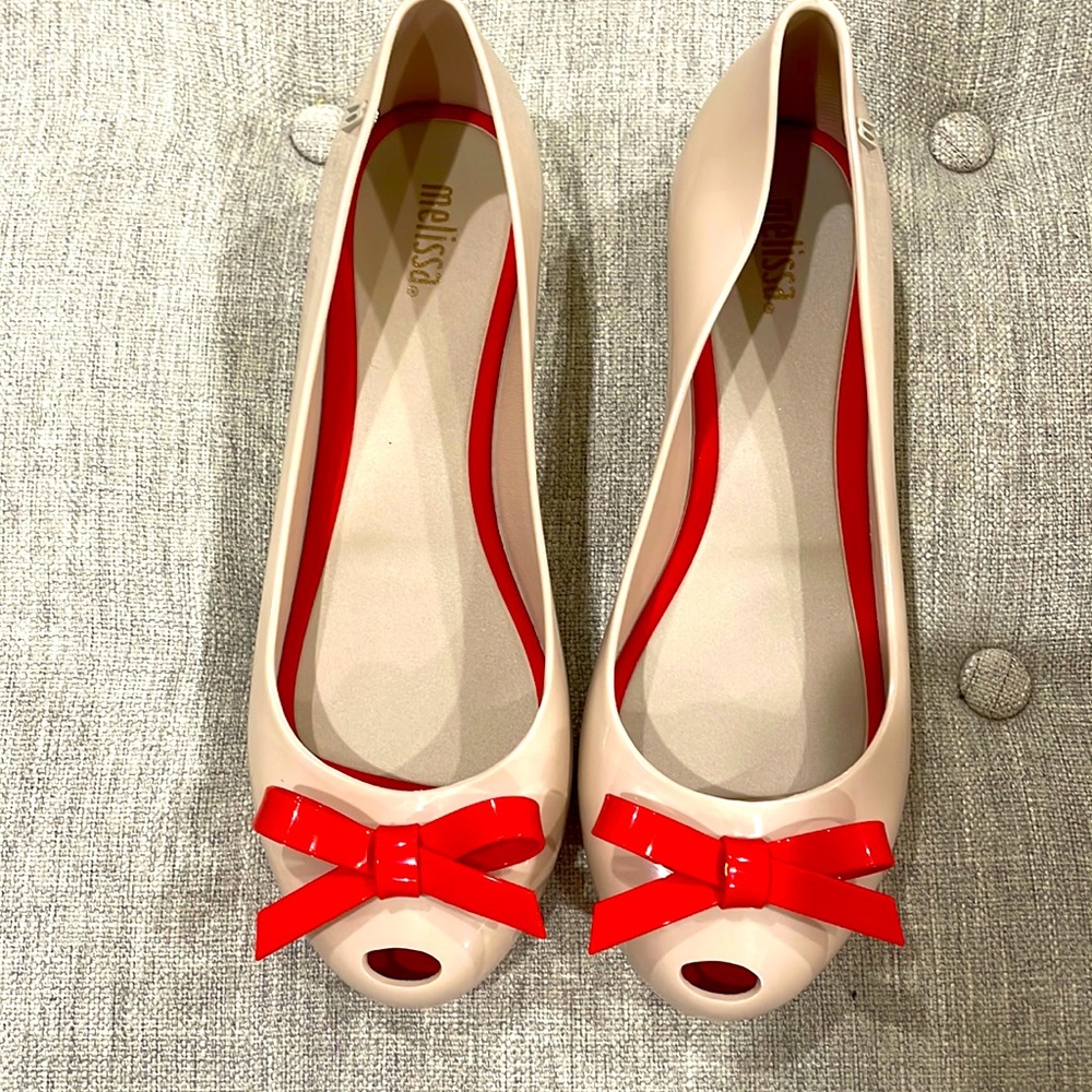 Super cute! Staple must-have Melissa flats with bright red bow